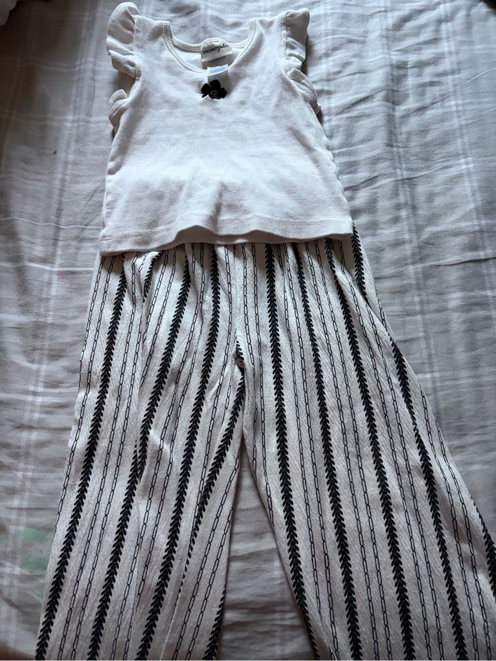 Sincerly Jules White Ruffle Sleeve Top with Black Striped Pants set